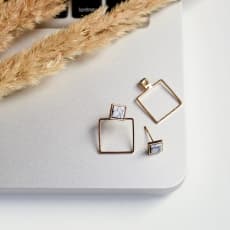 Earrings on laptop